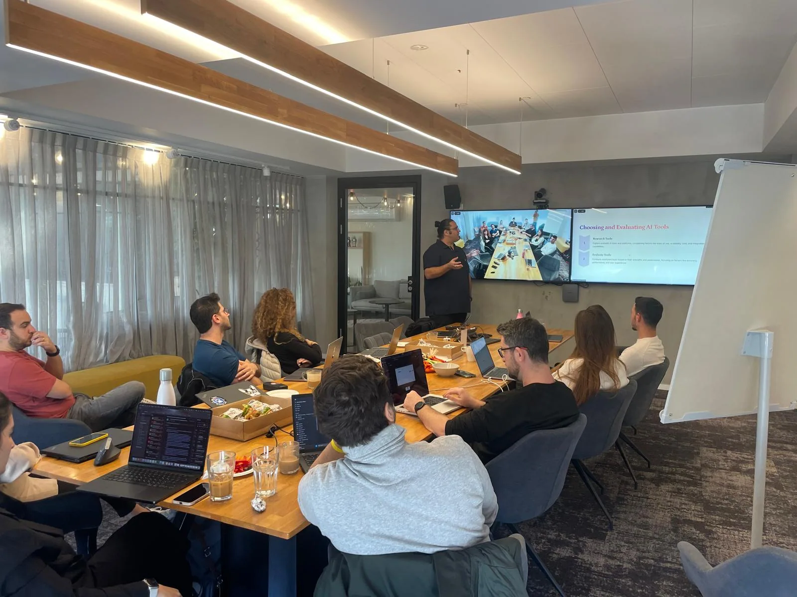 Company-wide AI enablement day with leadership and product teams